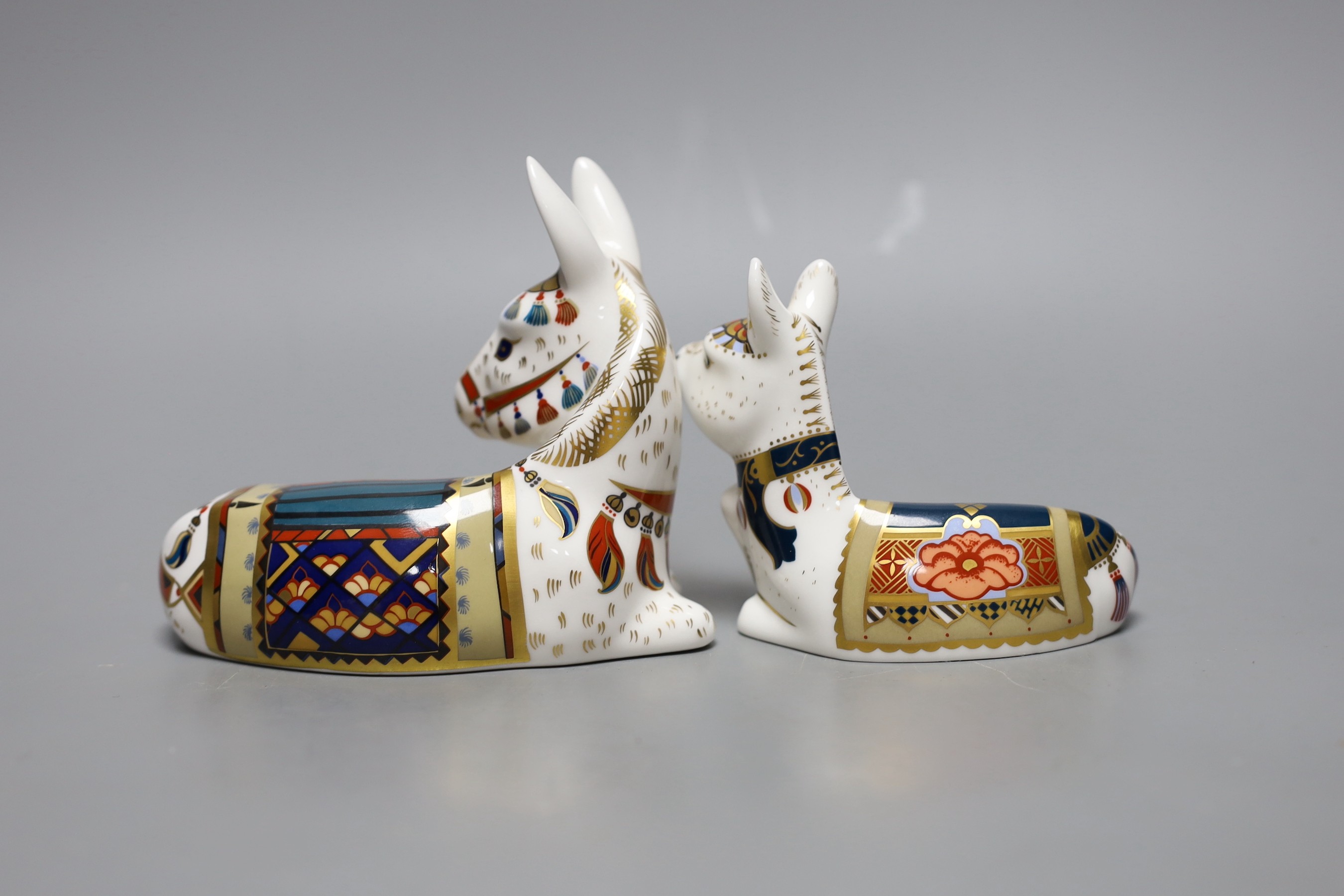 Two Royal Crown Derby paperweights - Donkey and Donkey Foal, both with gold stoppers and boxes, no certificates